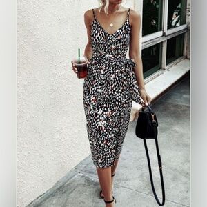 Stunning Black, White, and Brunt Orange Patterened Wrap Dress with Lining